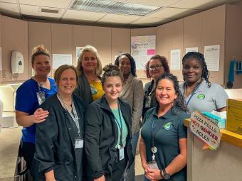 Clinic Staff Smiling in Lab