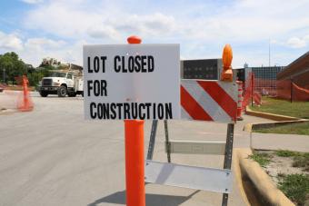 Construction sign that reads "Lot Closed for Construction."